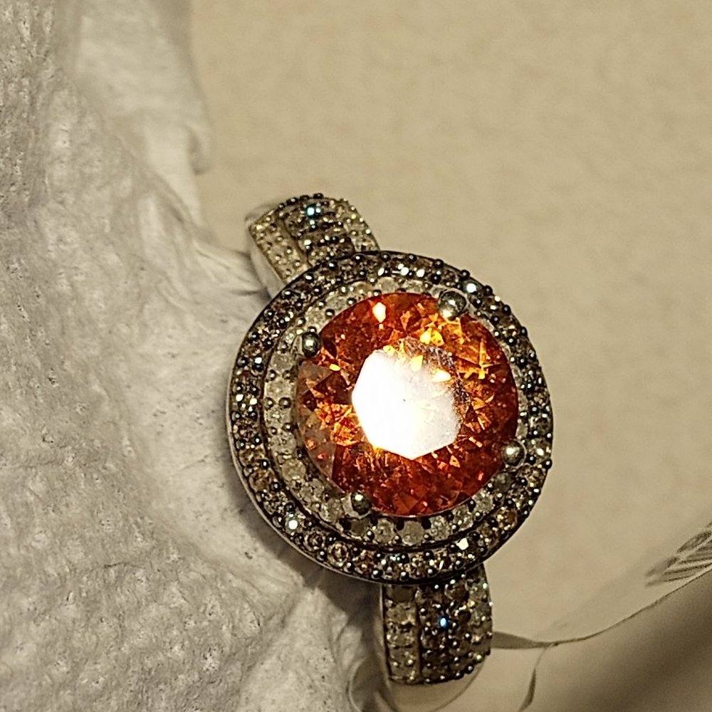 NEW   Orange Sphalerite  with a double halo of Champagne and White Diamonds